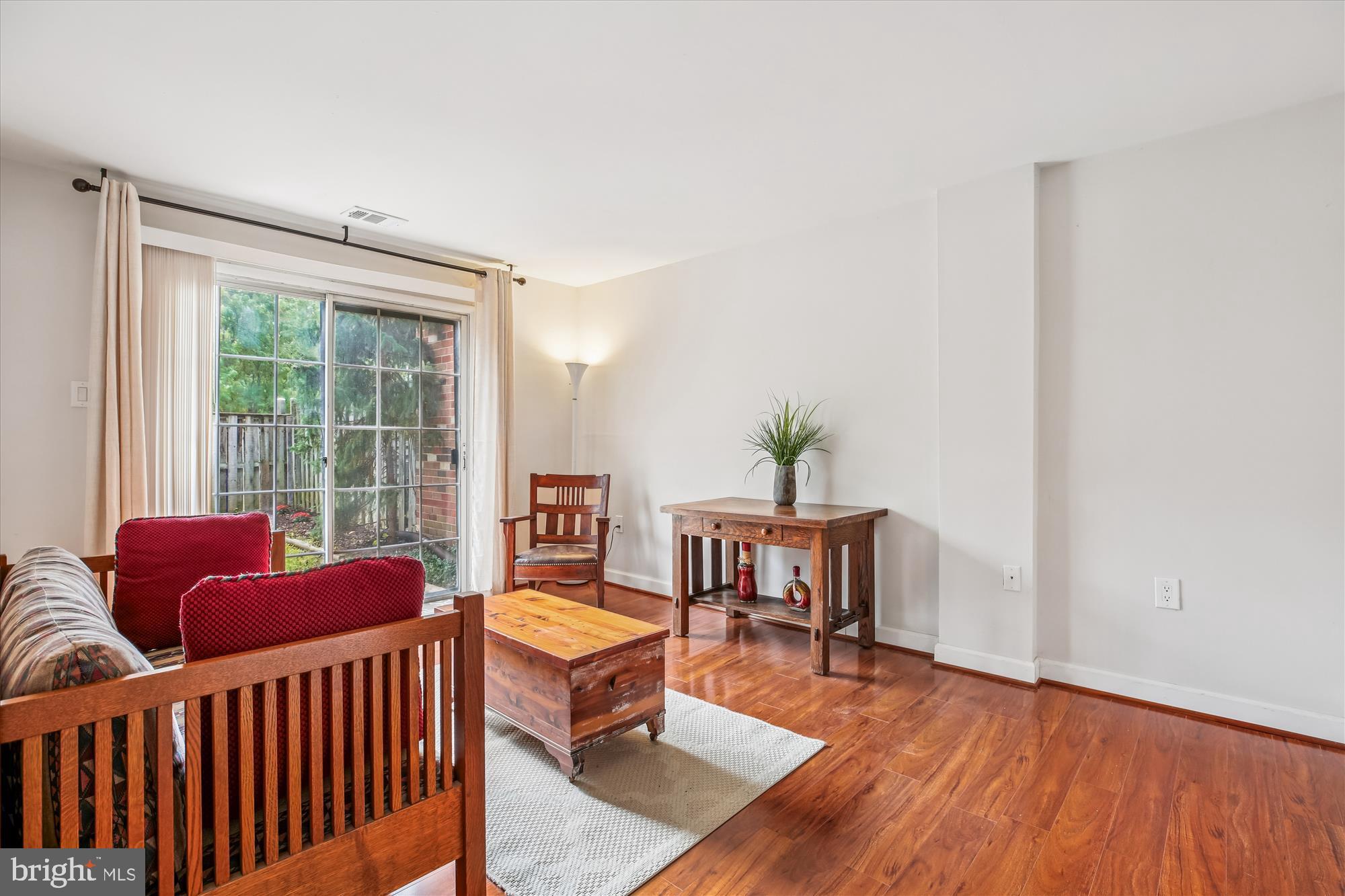 2702 Atlanta Drive, Unit 72702 Silver Spring, MD 20906 - Photo 38 of 55 a living room with furniture and a window