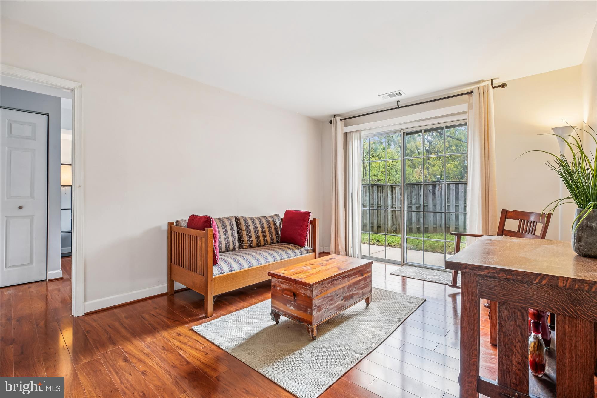 2702 Atlanta Drive, Unit 72702 Silver Spring, MD 20906 - Photo 39 of 55 a living room with furniture and a window