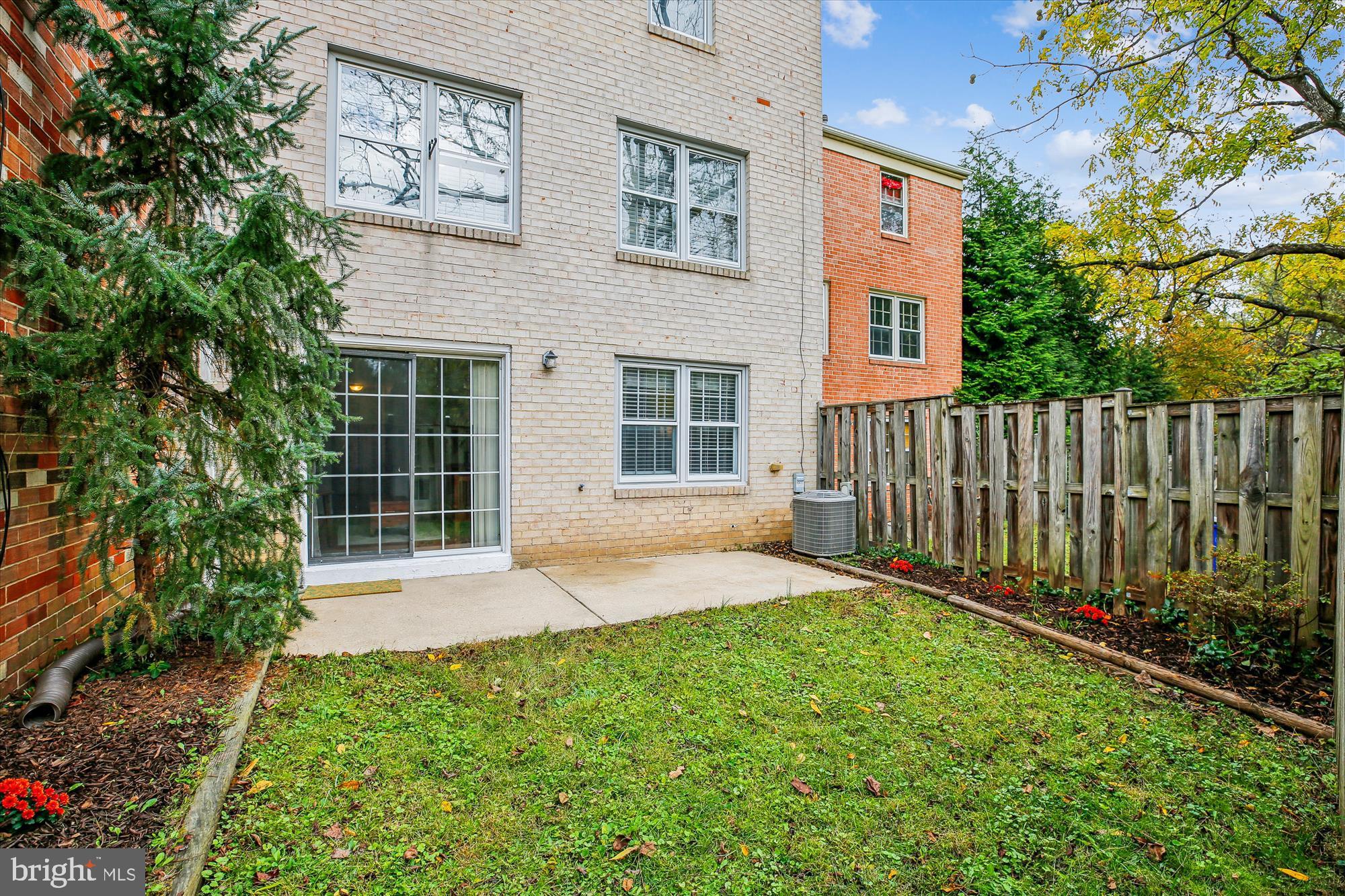 2702 Atlanta Drive, Unit 72702 Silver Spring, MD 20906 - Photo 52 of 55 a view of a house with a yard and pathway