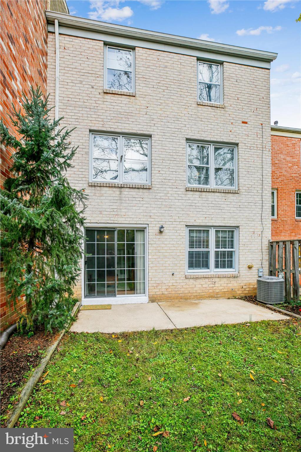 2702 Atlanta Drive, Unit 72702 Silver Spring, MD 20906 - Photo 53 of 55 a front view of a house with a yard