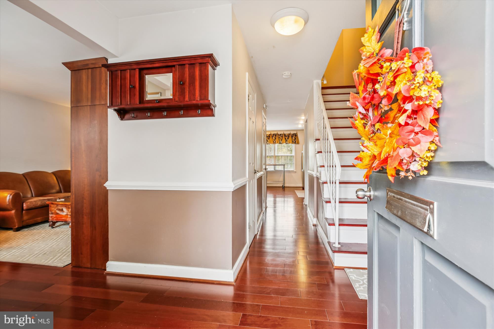 2702 Atlanta Drive, Unit 72702 Silver Spring, MD 20906 - Photo 6 of 55 a view of a hallway with wooden floor and furniture