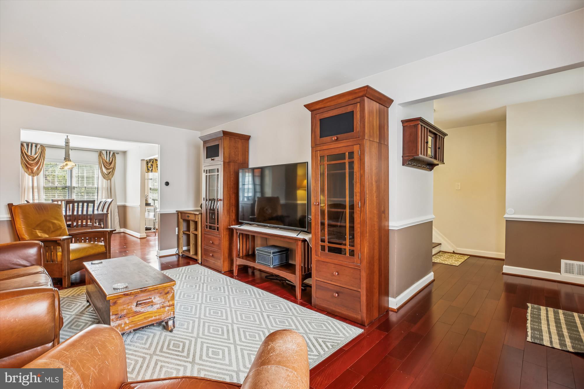 2702 Atlanta Drive, Unit 72702 Silver Spring, MD 20906 - Photo 9 of 55 a living room with furniture and a flat screen tv