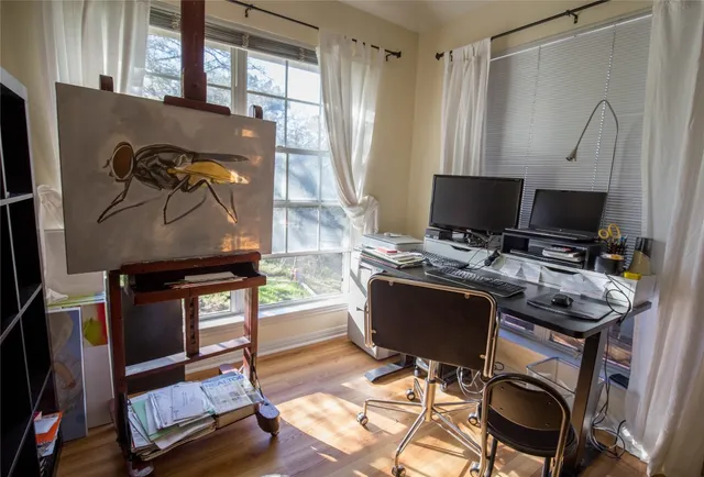 a workspace with furniture and window