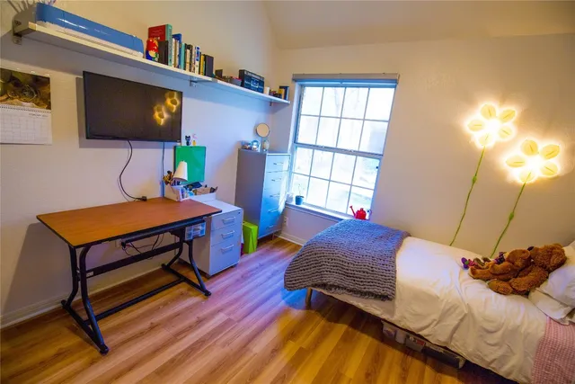 a view of a workspace with a table and couch