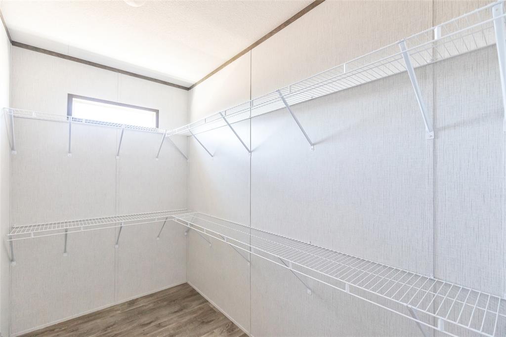 420 Haynes Street Merkel, TX 79536 - Photo 18 of 27 a view of an empty walk in closet