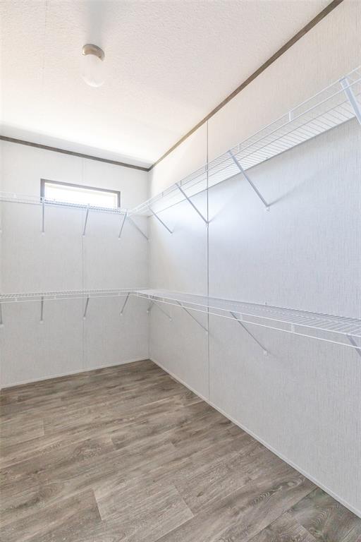 420 Haynes Street Merkel, TX 79536 - Photo 19 of 27 a view of an empty walk in closet