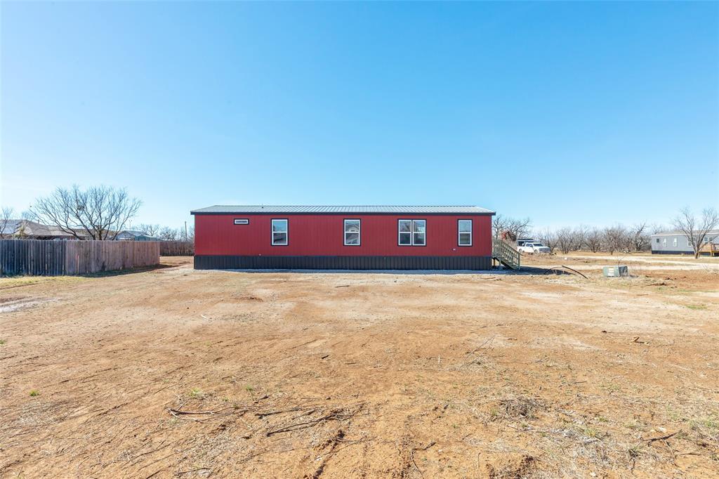 420 Haynes Street Merkel, TX 79536 - Photo 5 of 27 a view of empty room with a yard