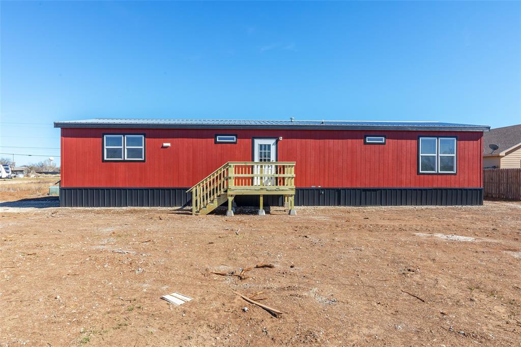 420 Haynes Street Merkel, TX 79536 - Photo 6 of 27 a front view of a house with a yard