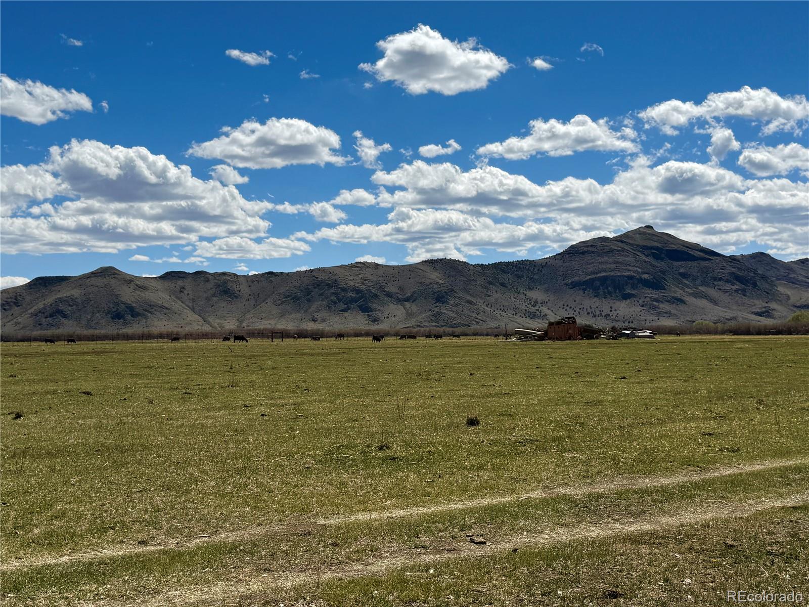 Hazard Ranch Saguache, CO 81149 - Photo 12 of 16 a view of an ocean and a mountain