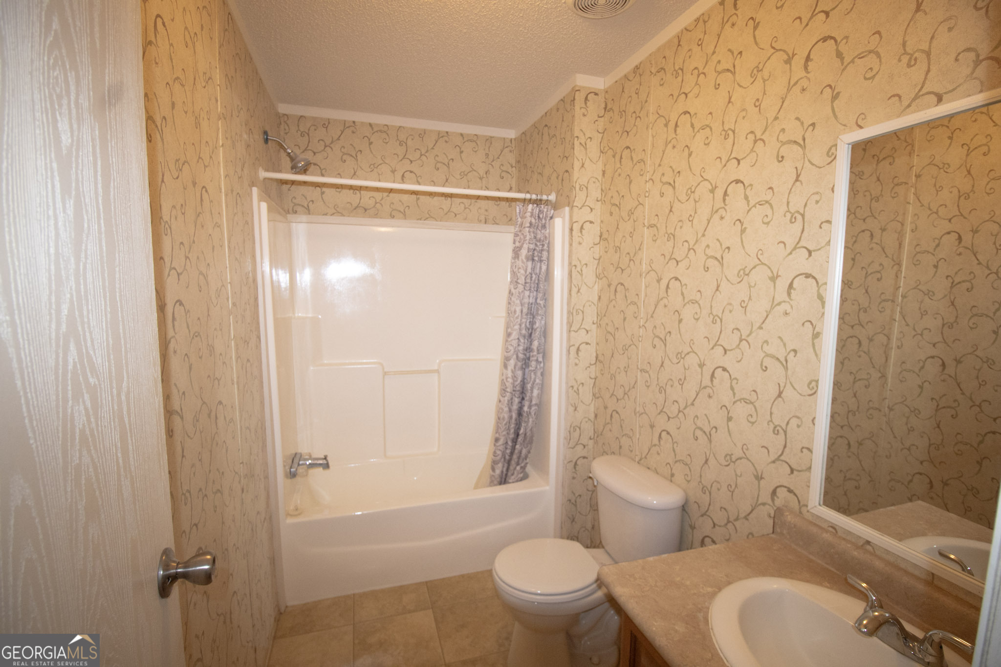 1776 Zettwell Road Statesboro, GA 30461 - Photo 16 of 20 a bathroom with a toilet and a shower