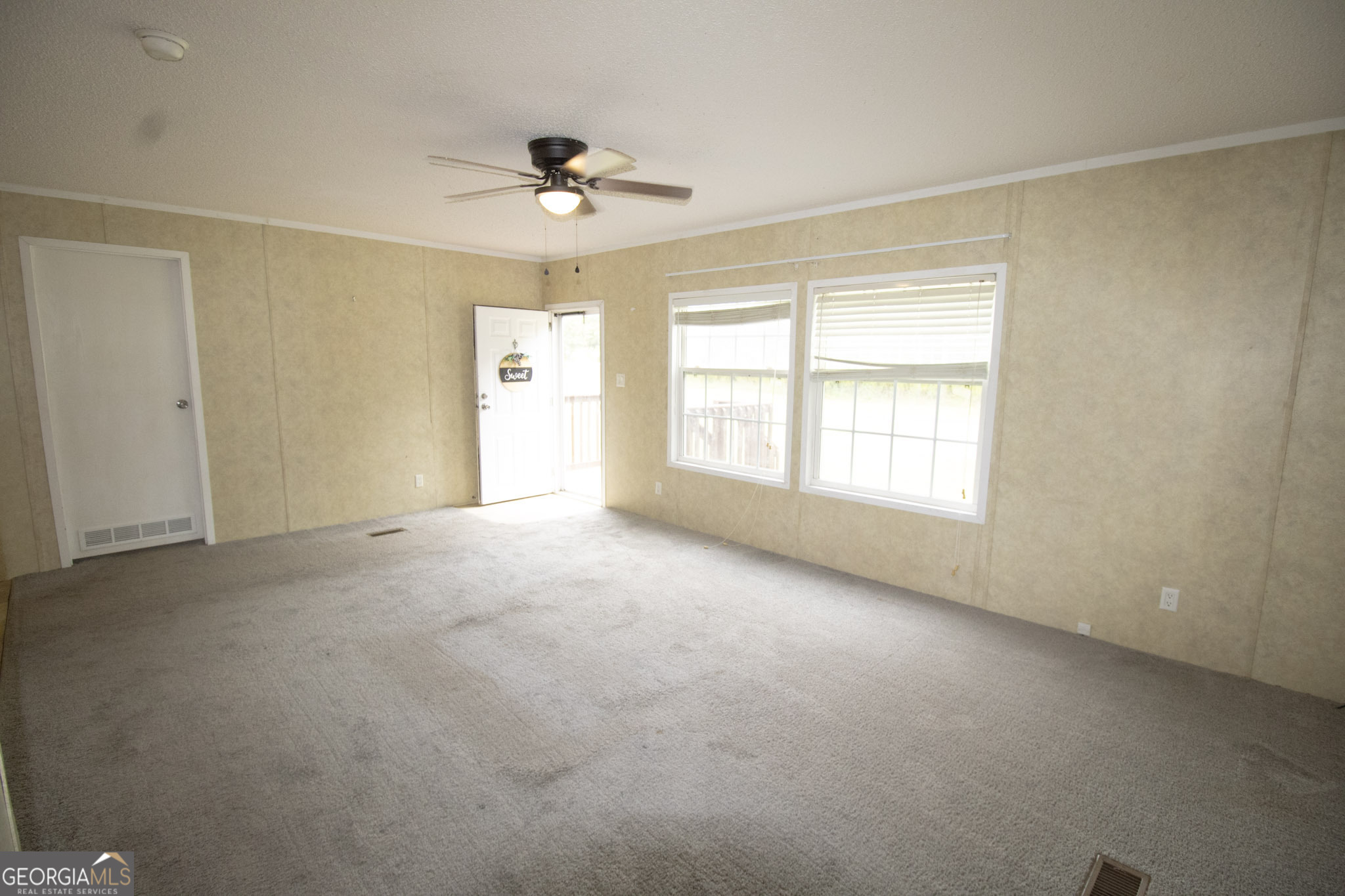 1776 Zettwell Road Statesboro, GA 30461 - Photo 17 of 20 a view of an empty room with a window