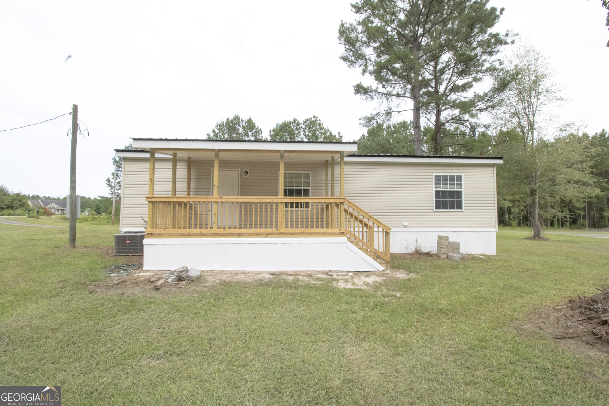 1776 Zettwell Road Statesboro, GA 30461 - Photo 20 of 20 a house view with a garden space