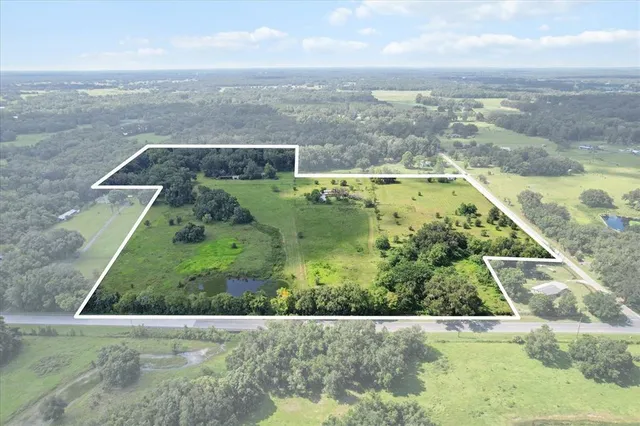 an aerial view of mountains and trees