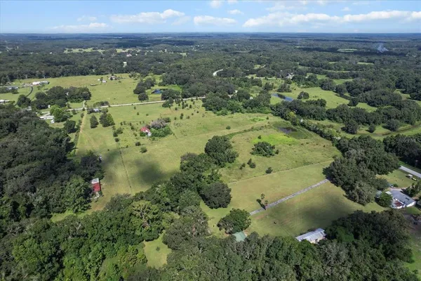 a view of a lake with a big yard