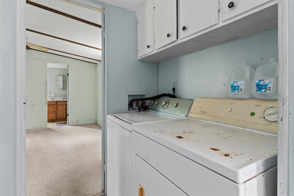 6177 County Road 625 Bushnell, FL 33513 - Photo 66 of 93 a utility room with dryer and washer
