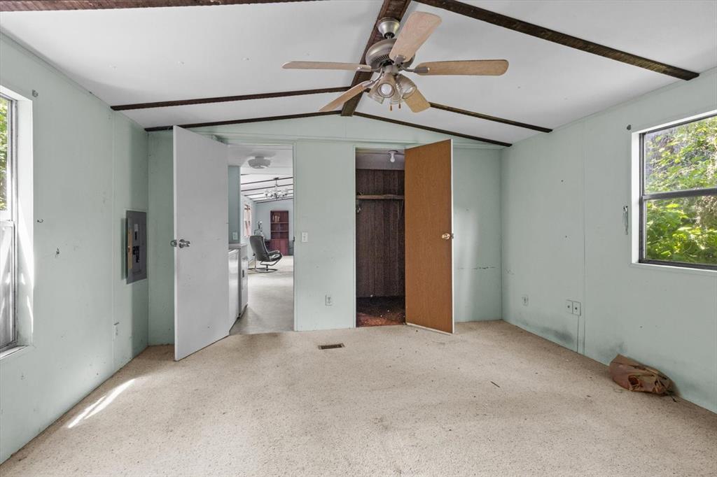 6177 County Road 625 Bushnell, FL 33513 - Photo 68 of 93 an empty room with fan and windows