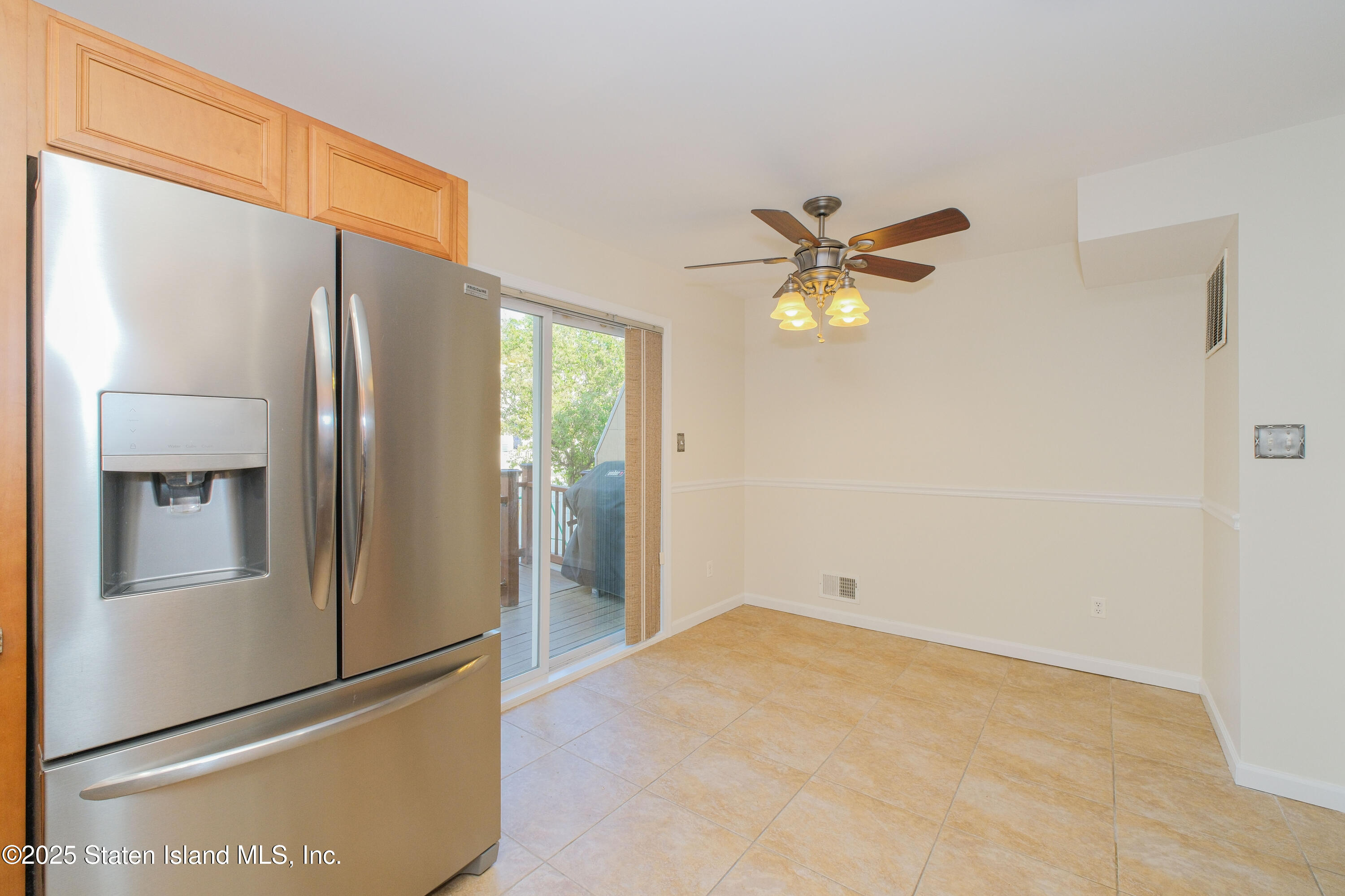 49 Endview Street Staten Island, NY 10312 - Photo 15 of 38 a view of an empty room with a ceiling fan