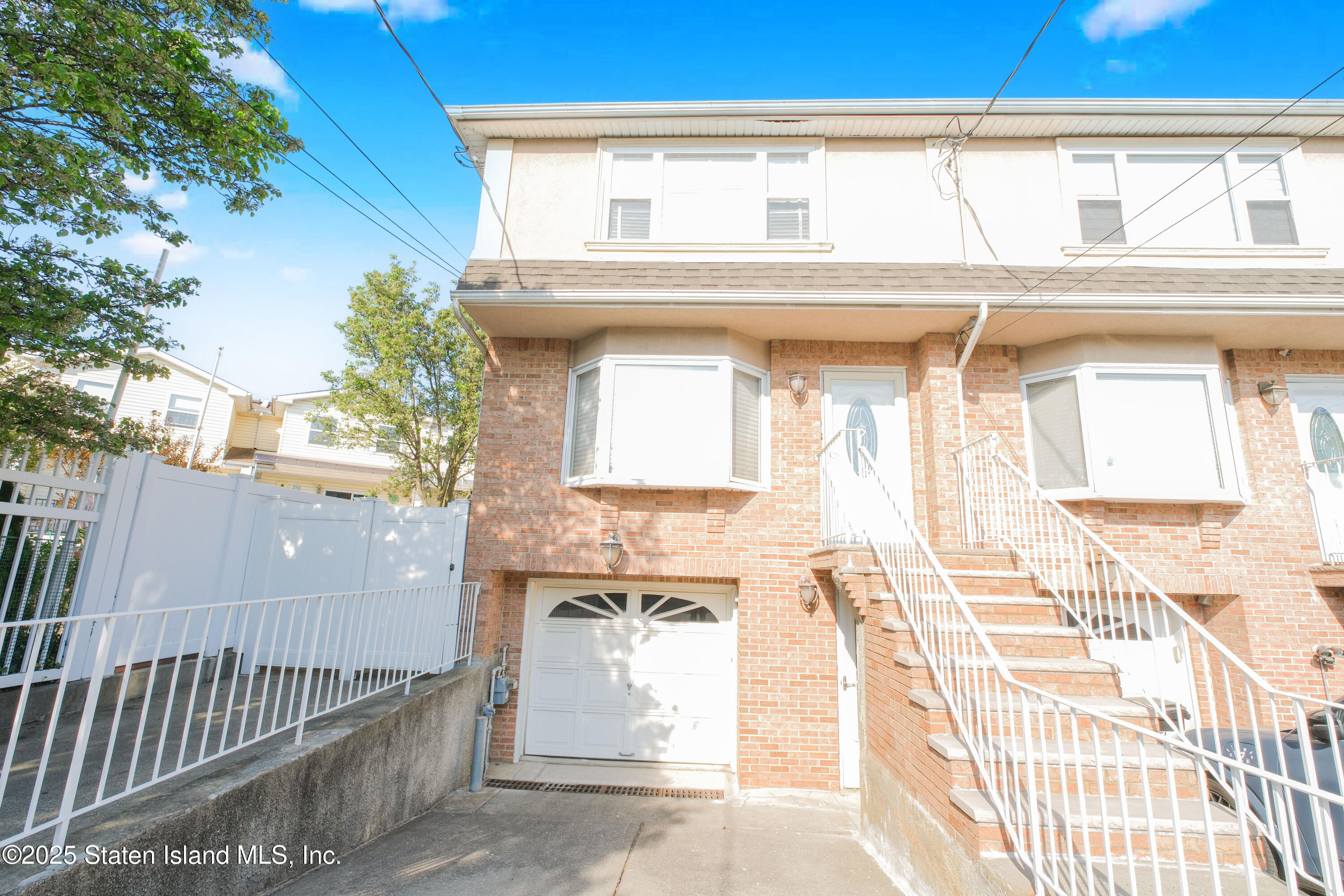 49 Endview Street Staten Island, NY 10312 - Photo 2 of 38 a view of a balcony with a sink and wooden floor