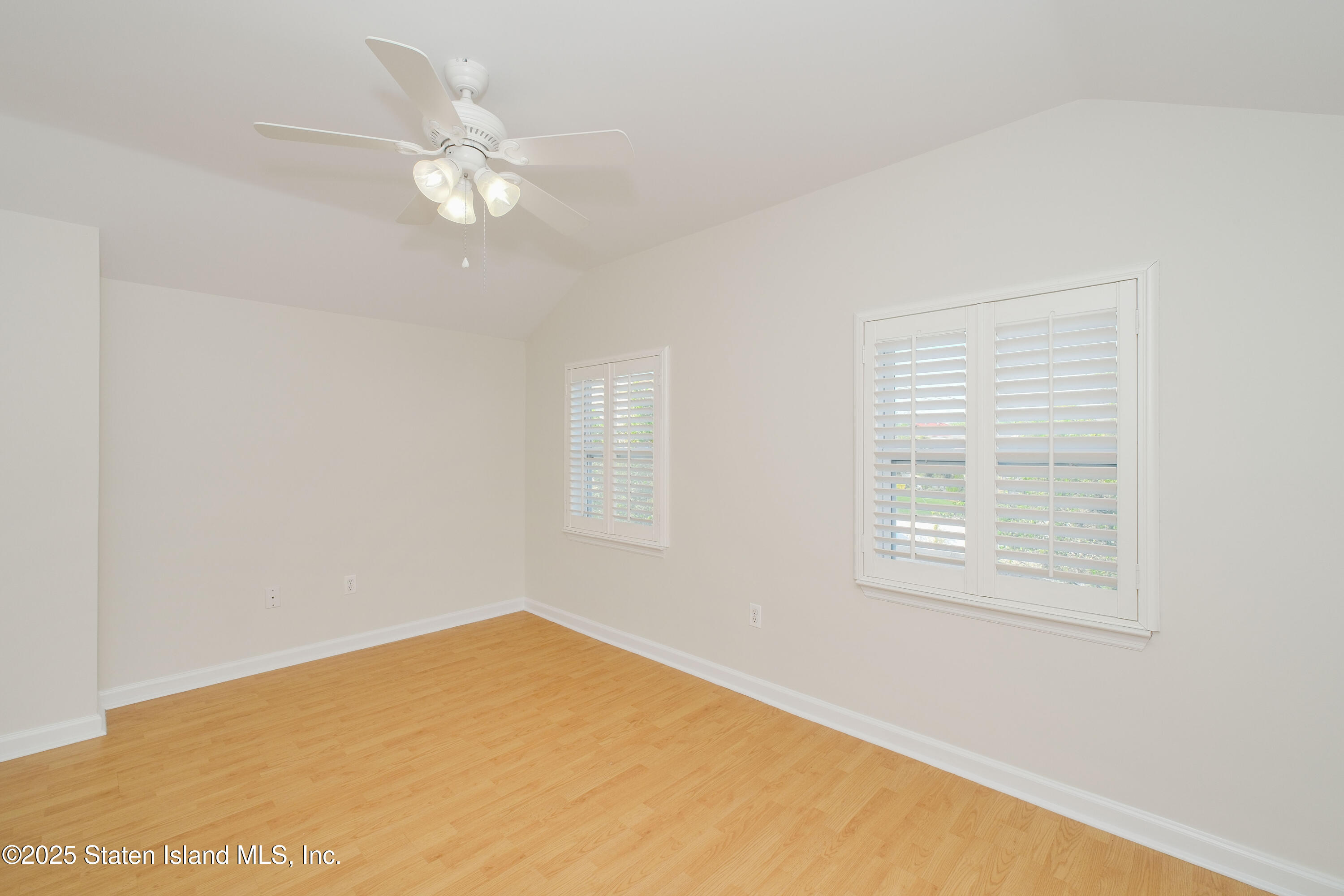 49 Endview Street Staten Island, NY 10312 - Photo 25 of 38 a view of an empty room with a window