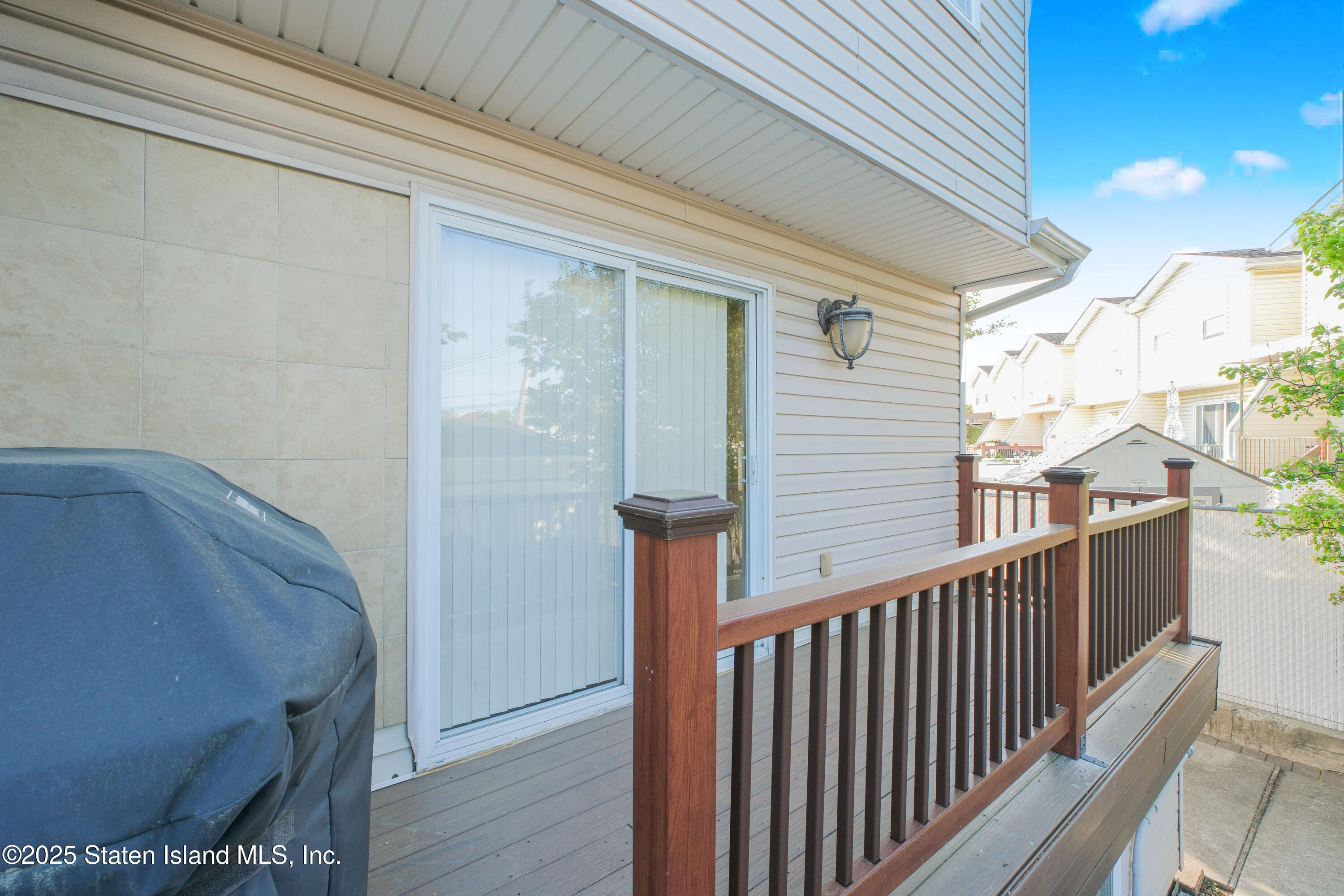 49 Endview Street Staten Island, NY 10312 - Photo 33 of 38 a view of a balcony with wooden floor