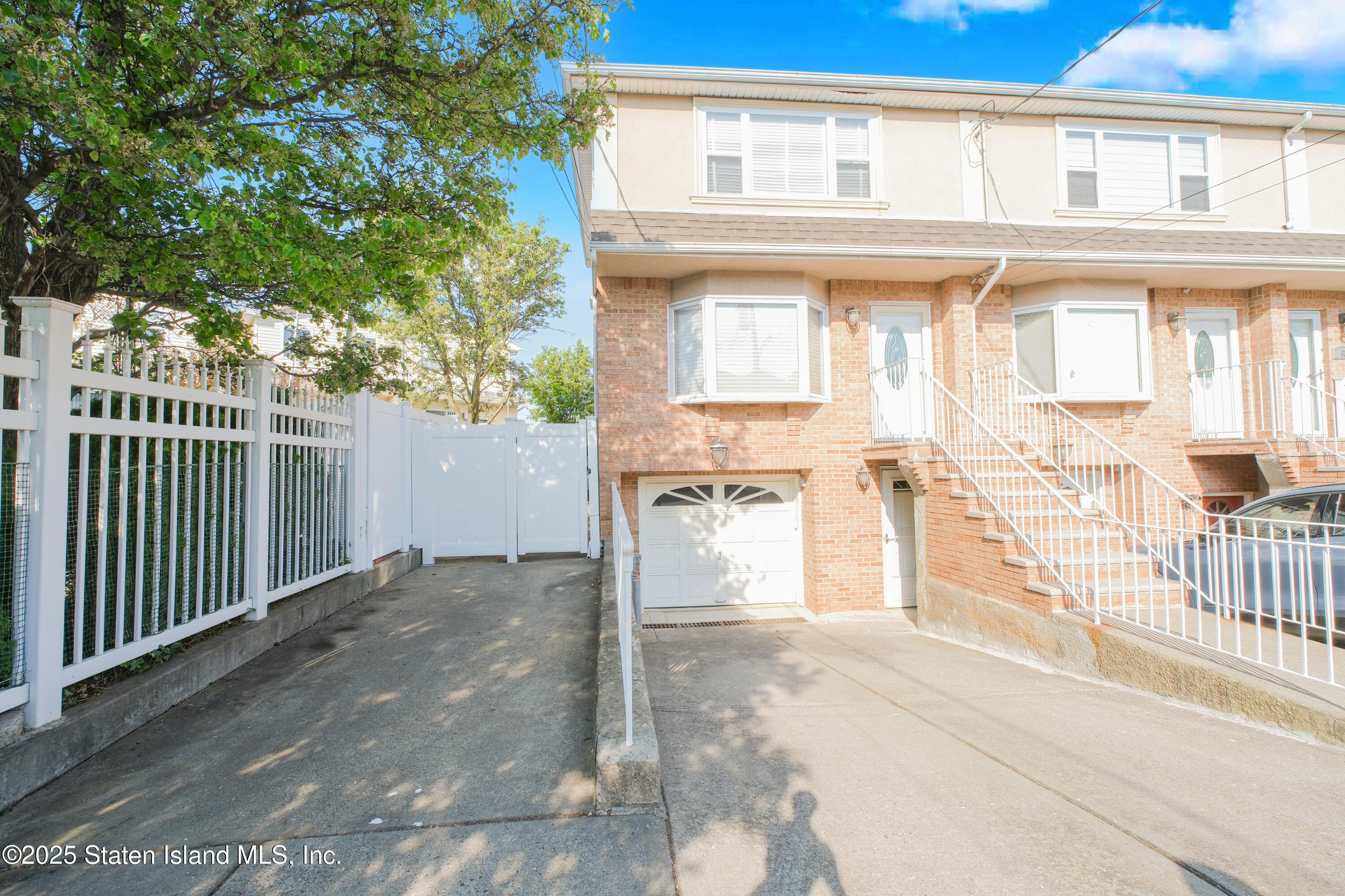 49 Endview Street Staten Island, NY 10312 - Photo 4 of 38 a view of a house with a outdoor space