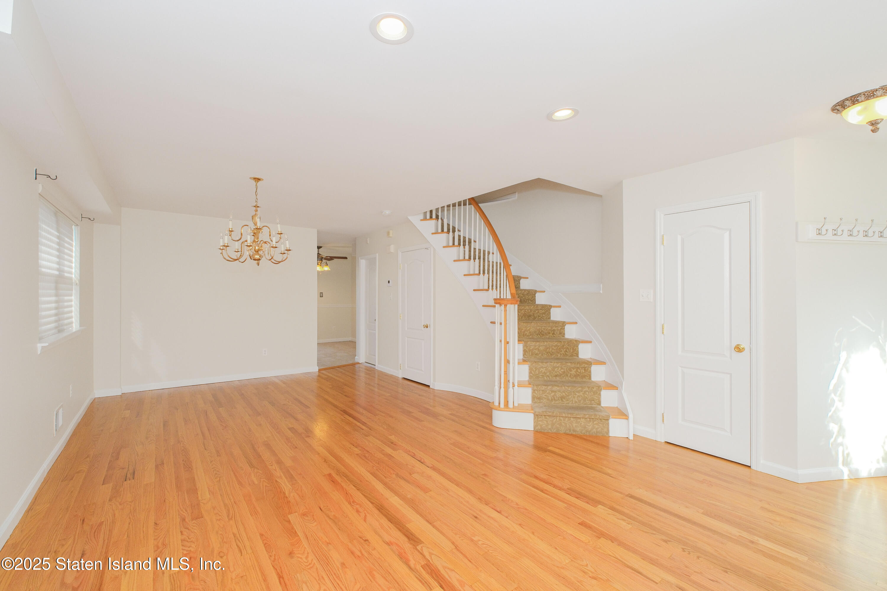 49 Endview Street Staten Island, NY 10312 - Photo 8 of 38 a view of empty room with wooden floor