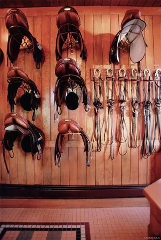 a yellow swimming pool is sitting in the middle of a yard