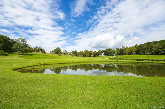 a view of a lake with a big yard