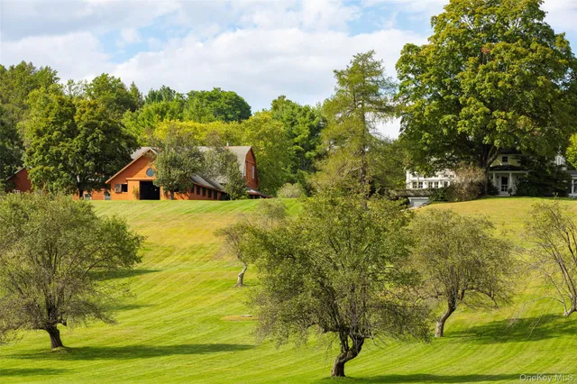 a view of a lake with a big yard