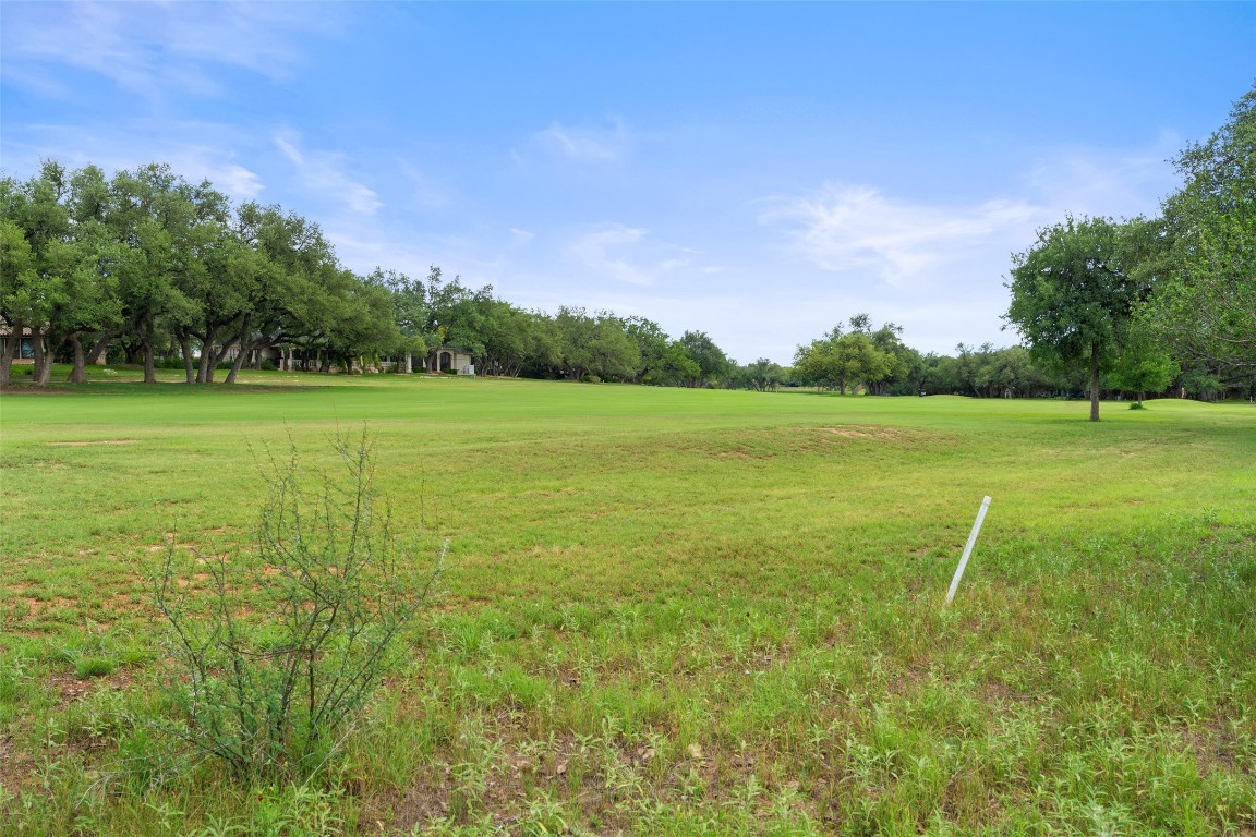 711 Sunfish Street Lakeway, TX 78734 - Photo 16 of 23 a view of a field with an trees