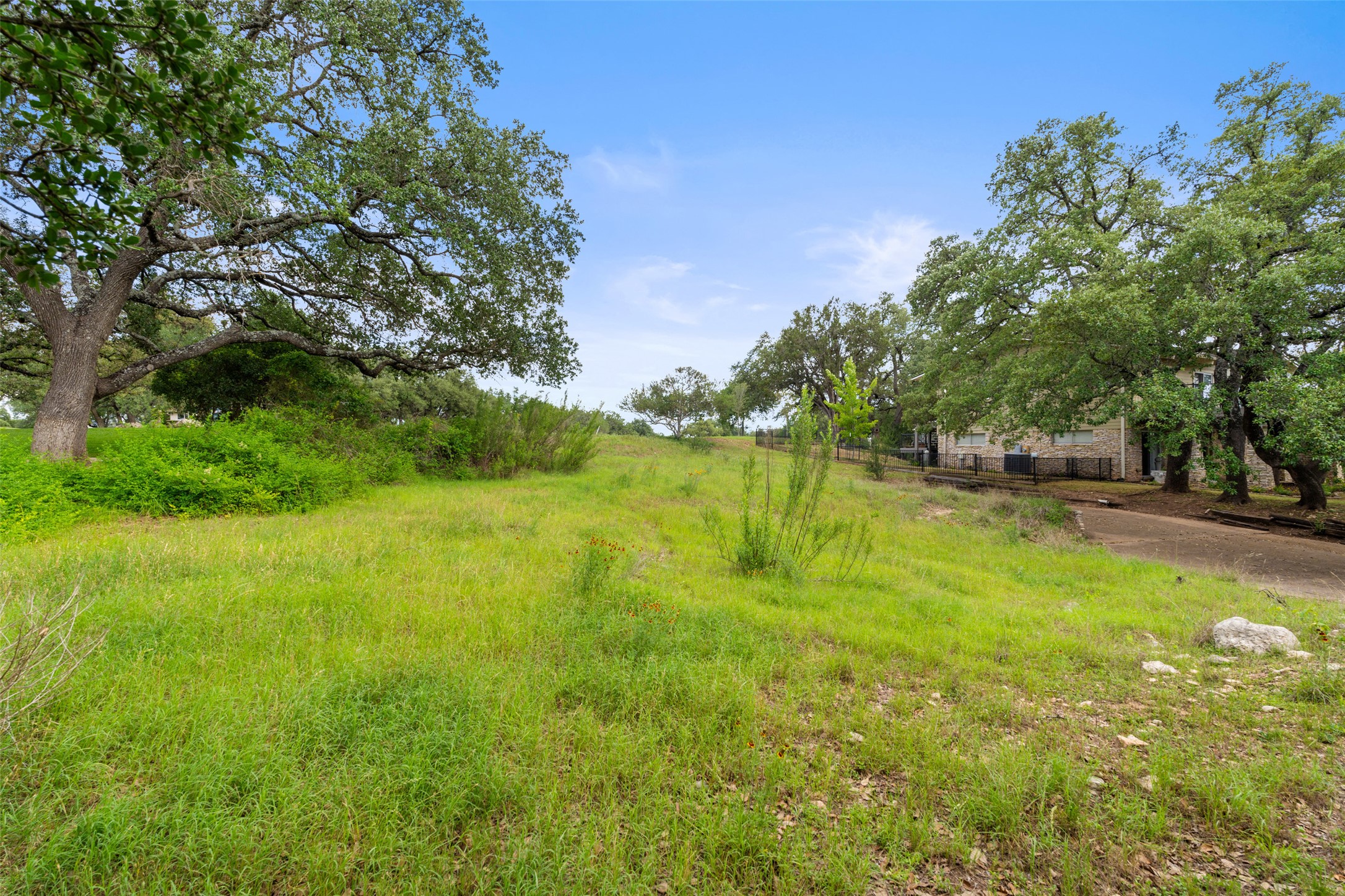 711 Sunfish Street Lakeway, TX 78734 - Photo 20 of 23 View of yard