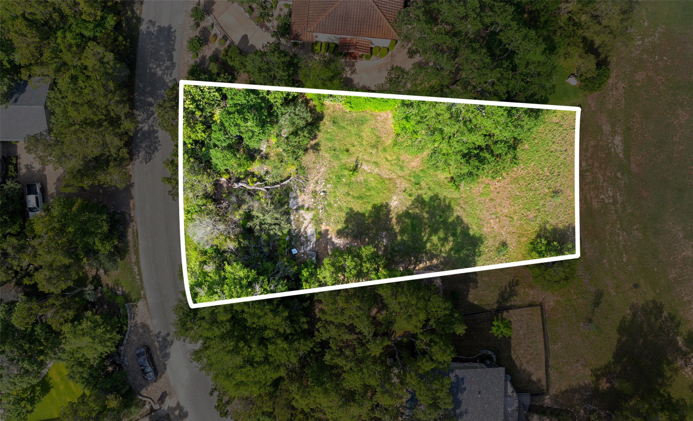 711 Sunfish Street Lakeway, TX 78734 - Photo 2 of 23 Aerial view of property's location featuring property parcel outlined
