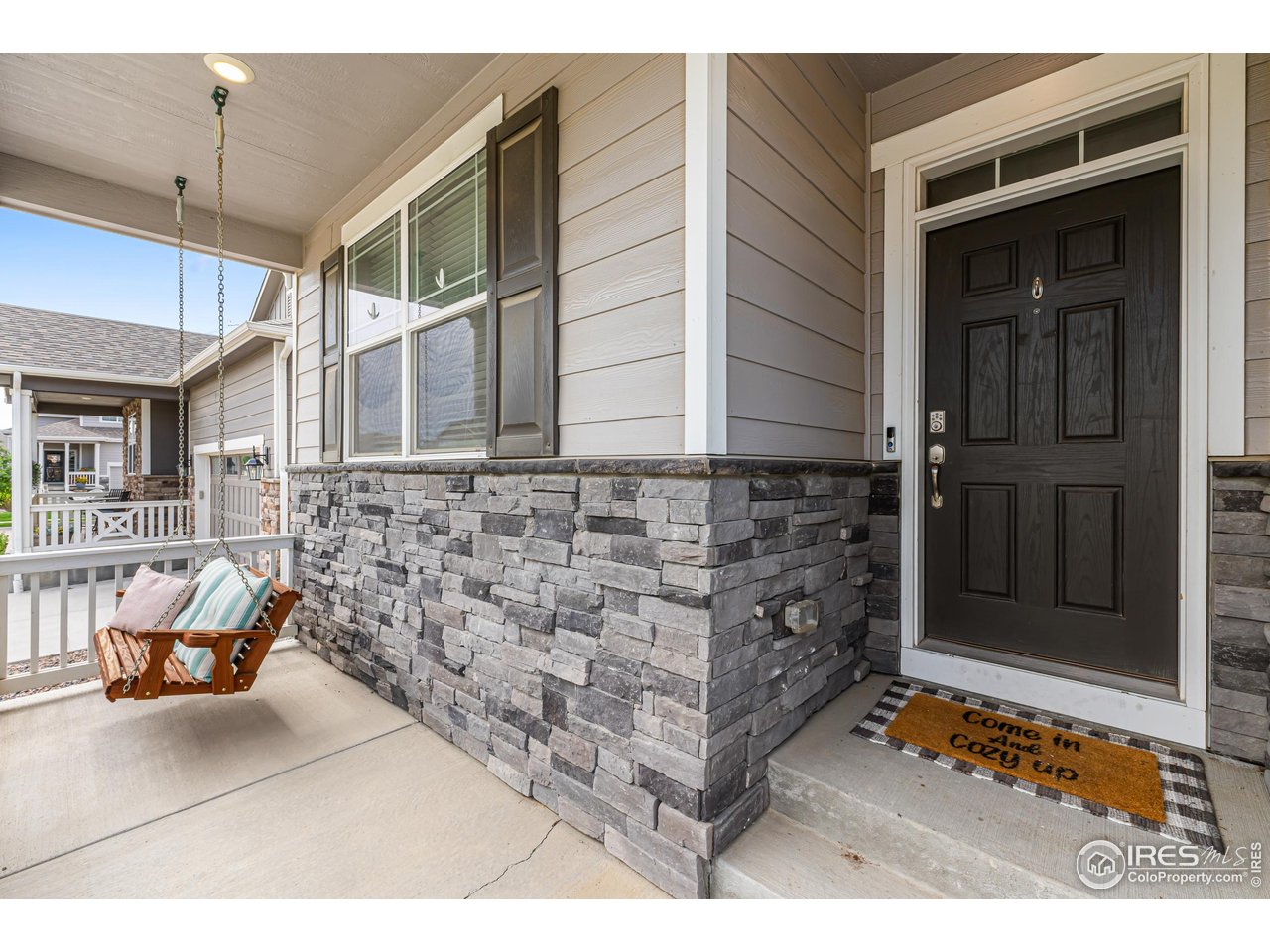 1780 Floret Drive Windsor, CO 80550 - Photo 4 of 36 a view of a entryway door of the house