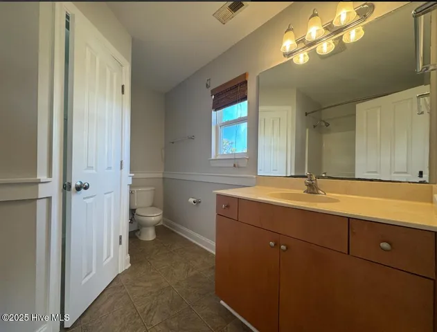 $2,695 | 1119 Swordfish Lane, Unit 1, Carolina Beach, NC 28428