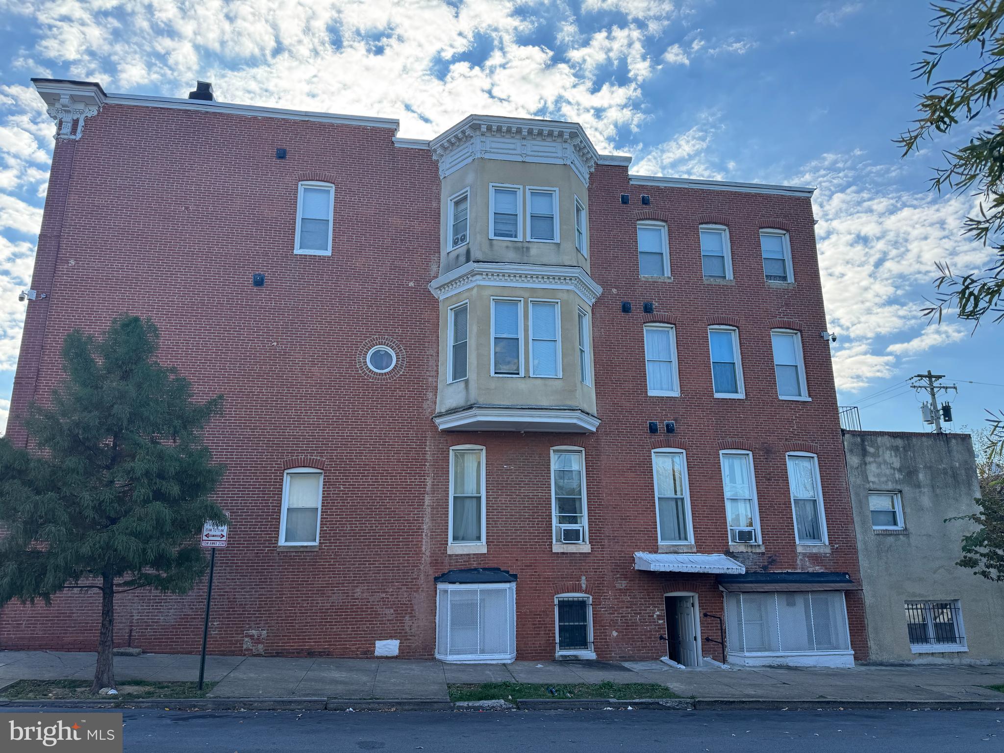 1736 McCulloh Street Baltimore, MD 21217 - Photo 13 of 14 a front view of residential houses with yard