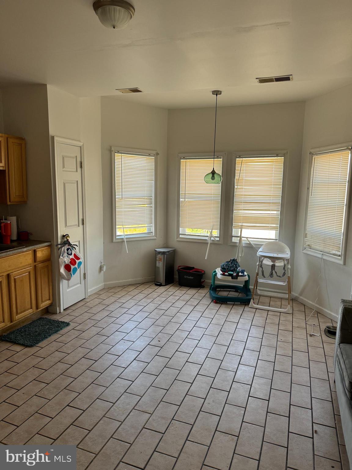 1736 McCulloh Street Baltimore, MD 21217 - Photo 2 of 14 a view of a room with window and couch
