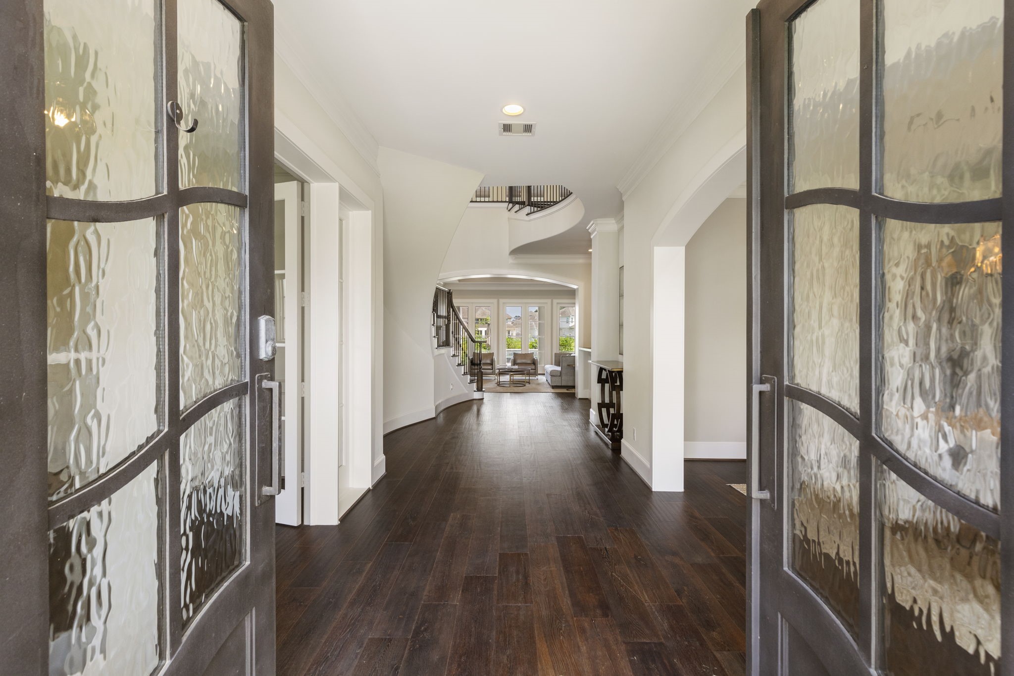 6806 West Warwick Lake Lane Spring, TX 77389 - Photo 3 of 50 a view of an entryway with wooden floor and windows