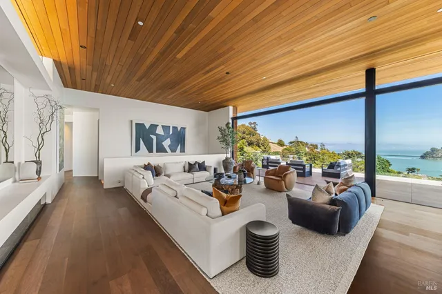 a spacious bedroom with a bed and window