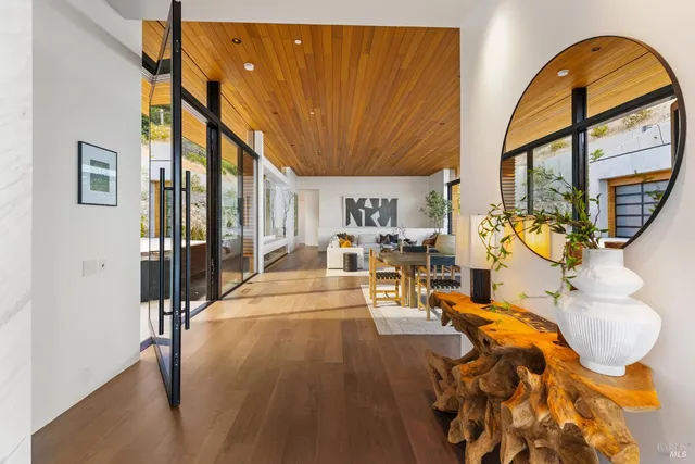 a living room with furniture with outer view