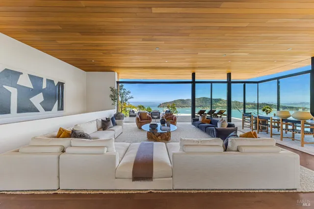 a view of swimming pool with a table and chairs