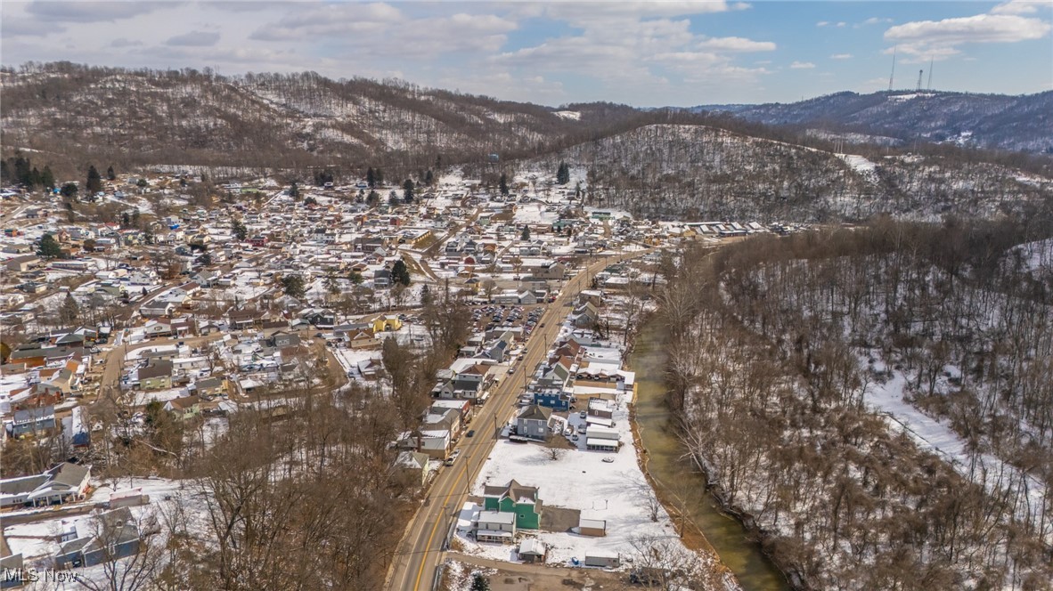 54899 National Road Bridgeport, OH 43912 - Photo 5 of 22 Snowy aerial view with a mountain view