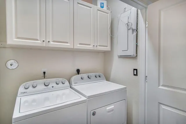 a utility room with dryer and washer