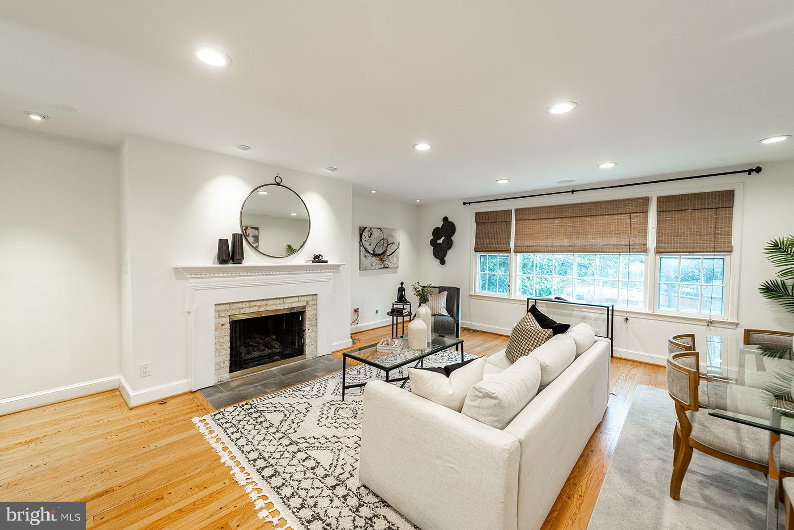 1734 Olde Towne Road Alexandria, VA 22307 - Photo 6 of 36 Living Area with Gas Fireplace and Oversized Windo
