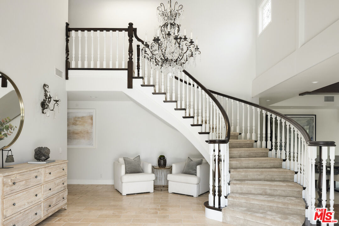 5933 Annie Oakley Road Hidden Hills, CA 91302 - Photo 16 of 22 a view of entryway and hall with wooden floor