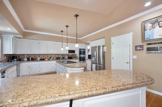 a view of a living room and dining room