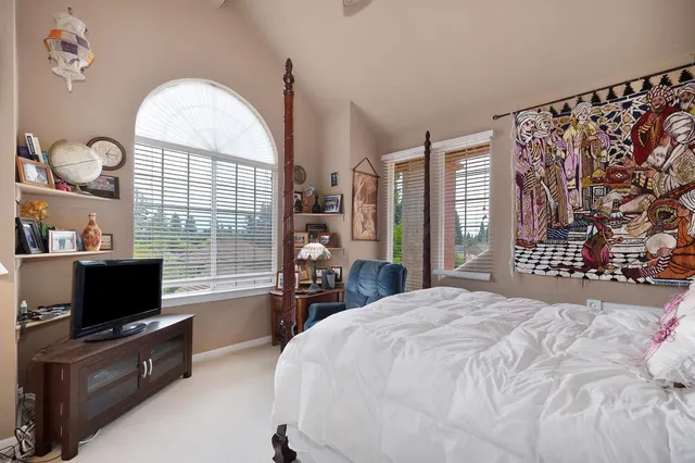 a bathroom with a sink vanity and mirror