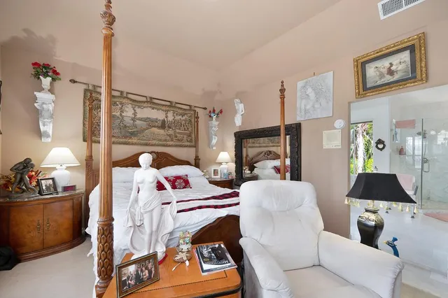 a view of a patio with couple of chairs