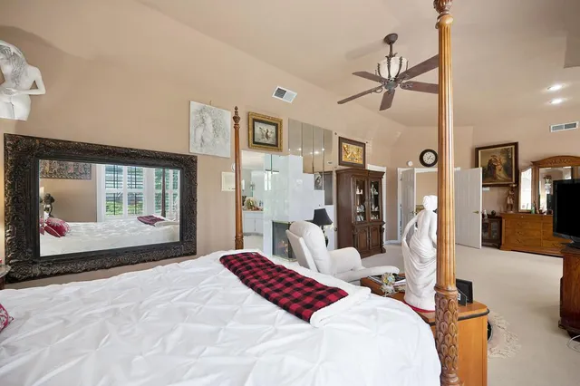 a view of a backyard with swimming pool