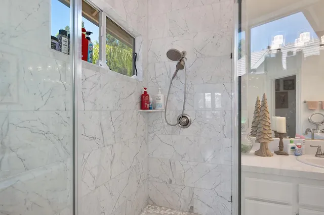 a swimming pool with outdoor seating yard and barbeque oven