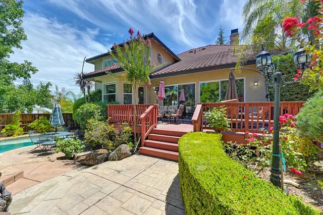 a view of a house with sitting area and furniture